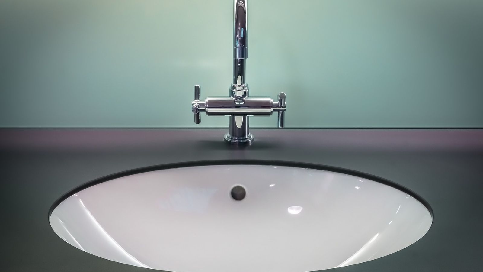 Bathroom sink above the cabinet where a slow leak may occur
