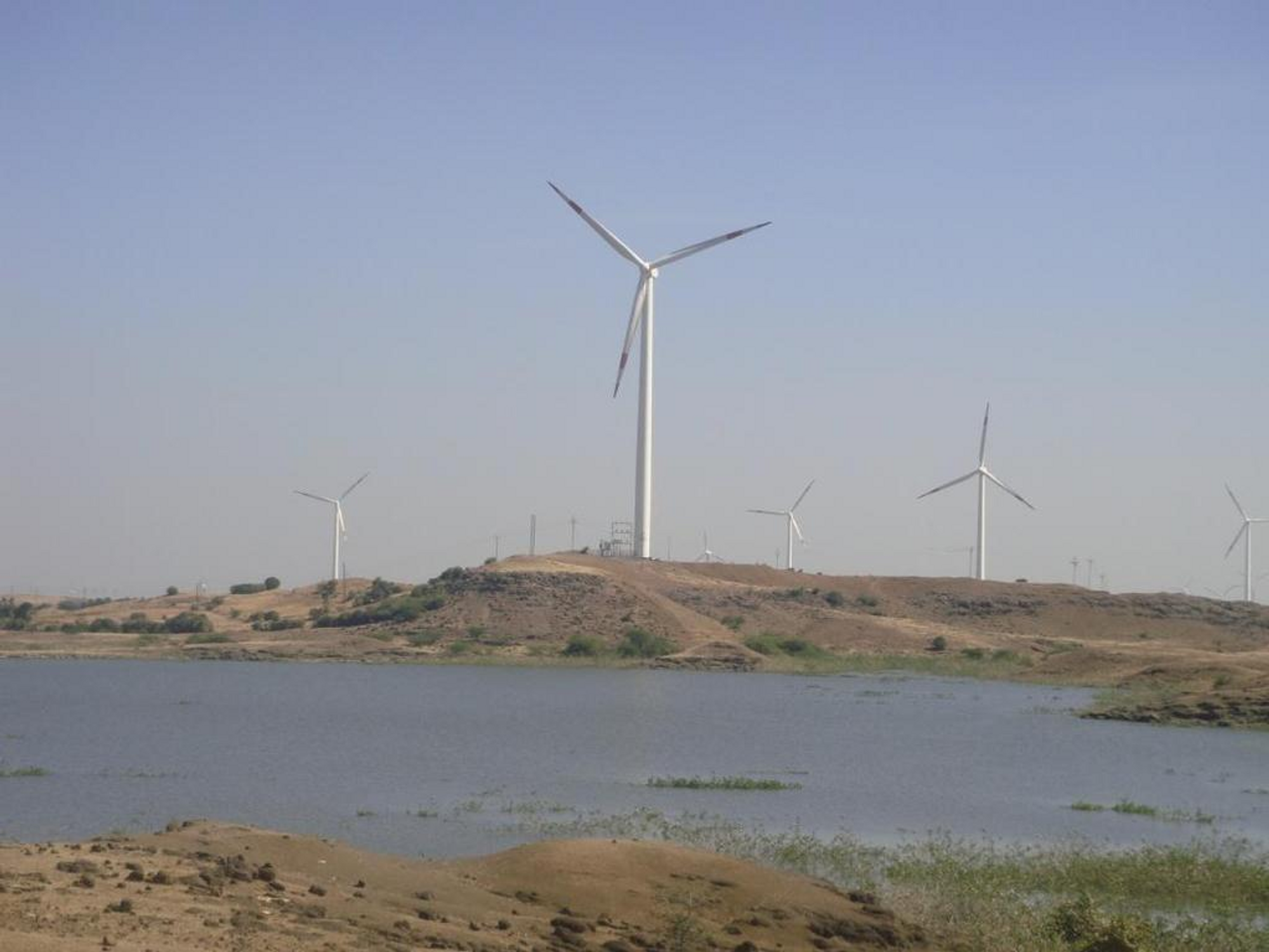 Five of the 16 wind turbines at the wind power project in Jaibhim 