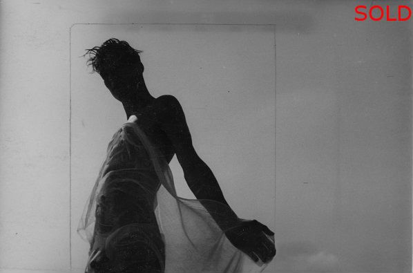 A male figure in silhouette half covered in wet cloth [P51]