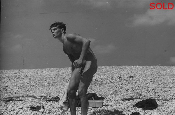 A male figure, drying himself on the beach [P41]