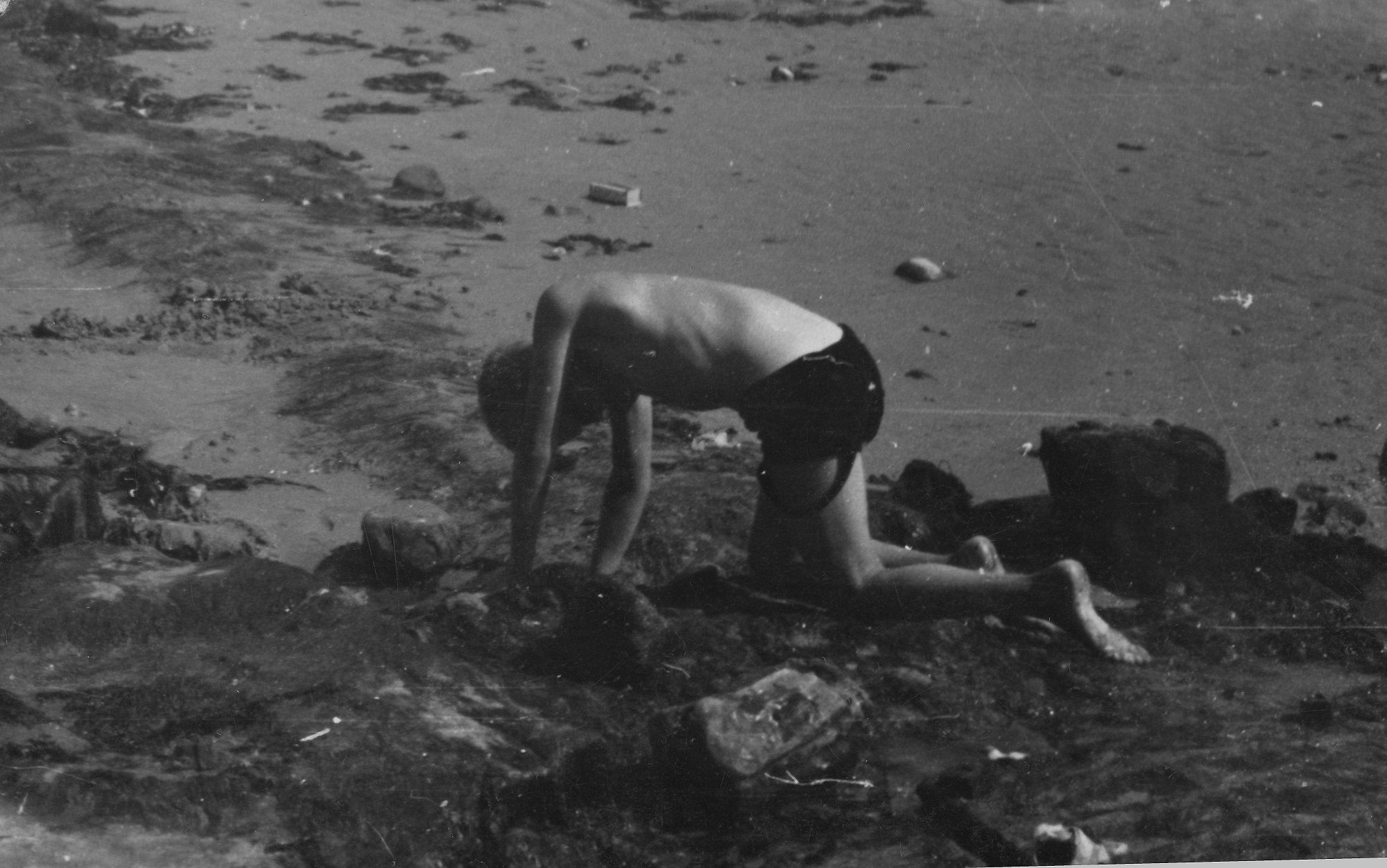 Male figure on hands and knees [P57]