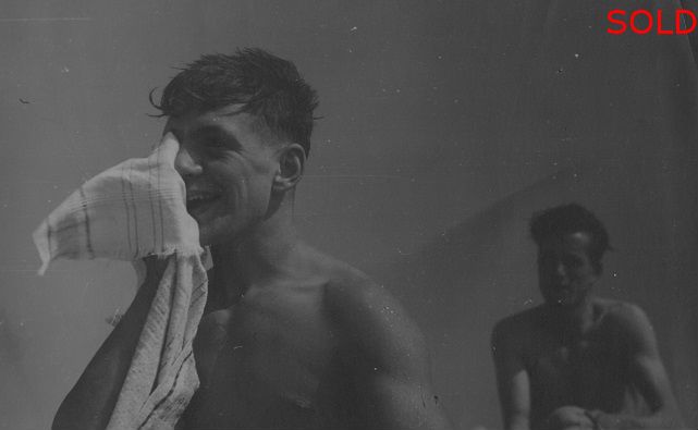 Two male figures, one drying his face with towel [P23]