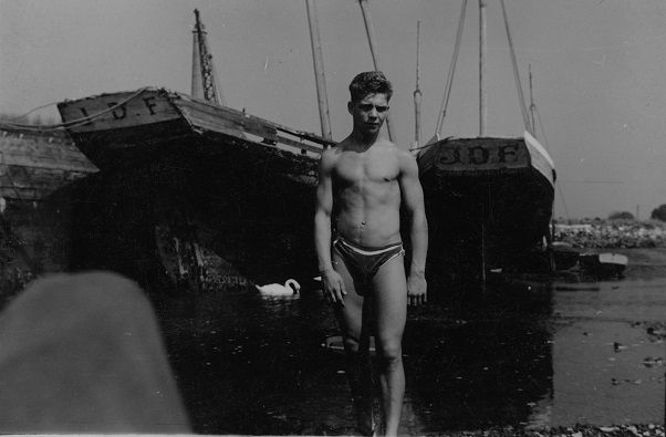 Young man at water’s edge [P17]