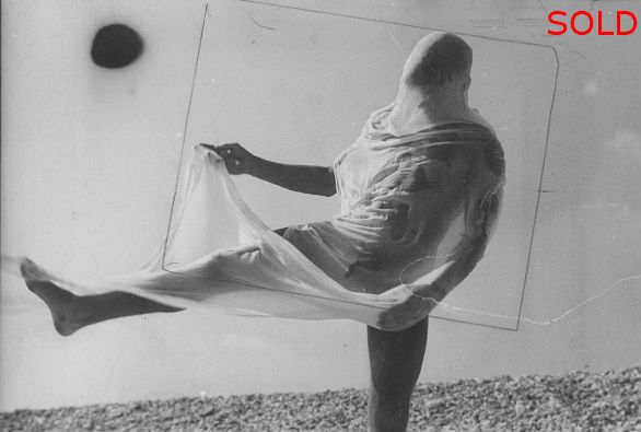 A male figure kicking, draped in wet cloth [P1] 