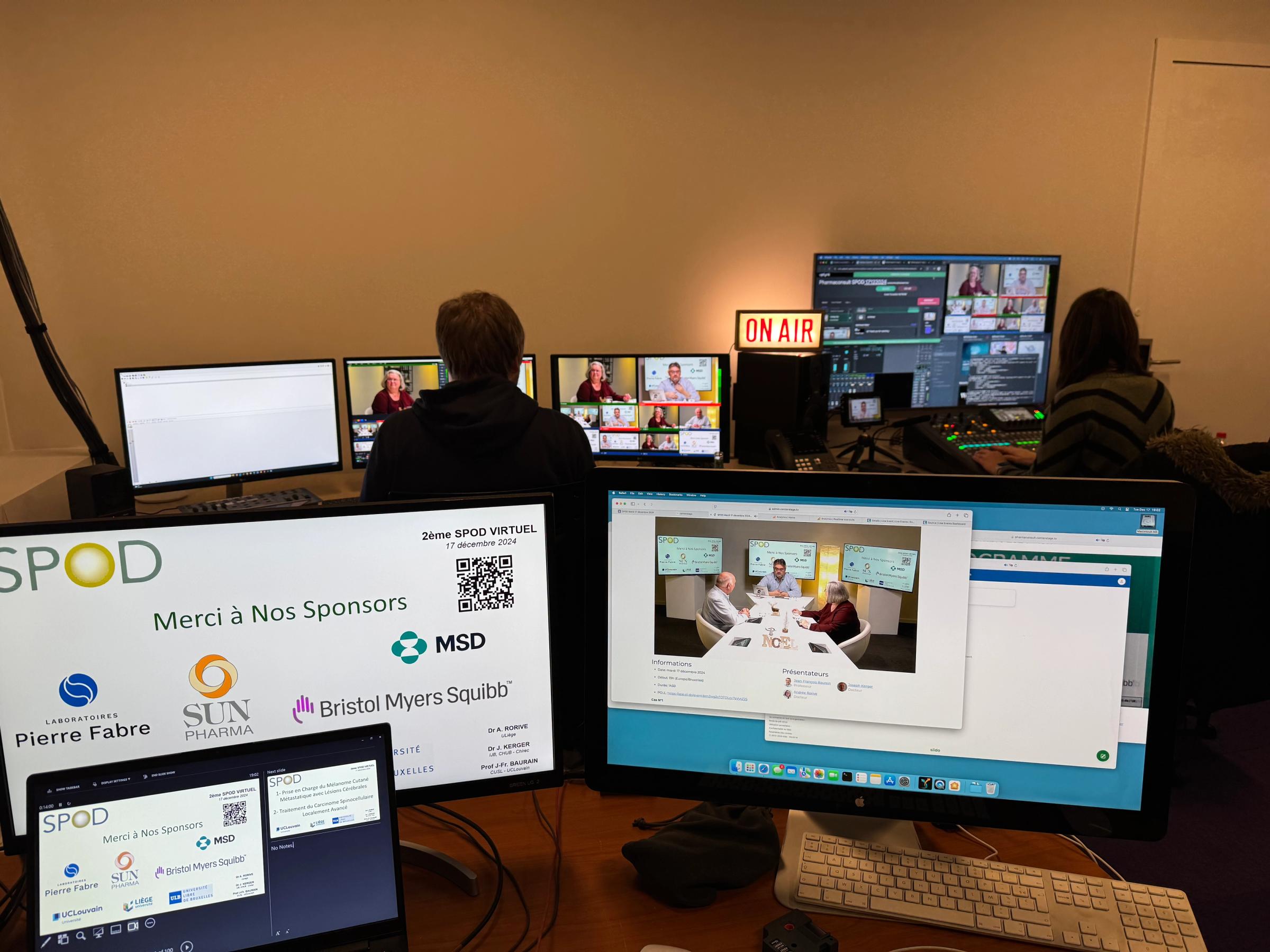 A virtual session in production, remote speakers and viewers on screen instead of travelling in