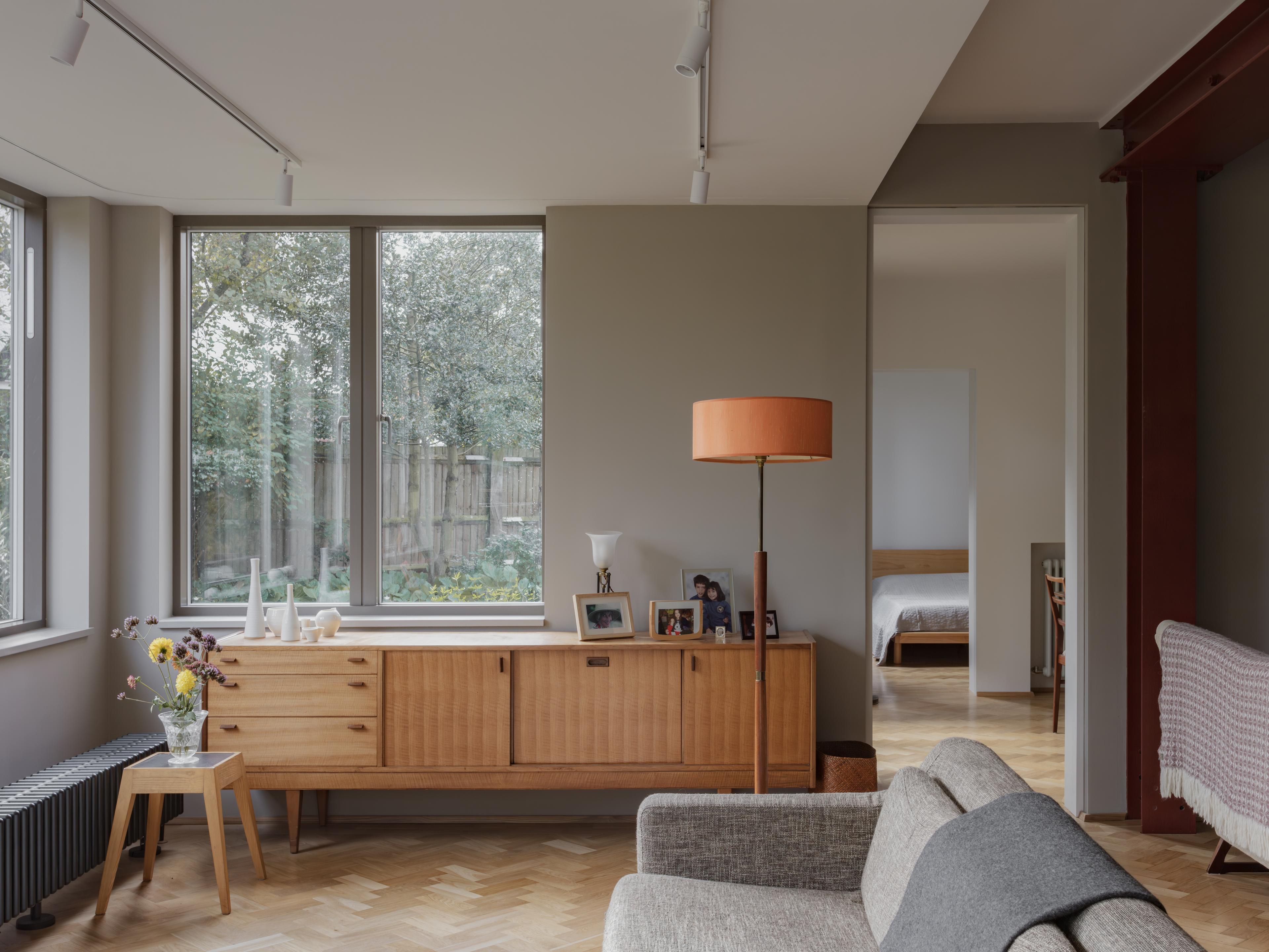 An existing extension is reconfigured as a large bay window facing the garden