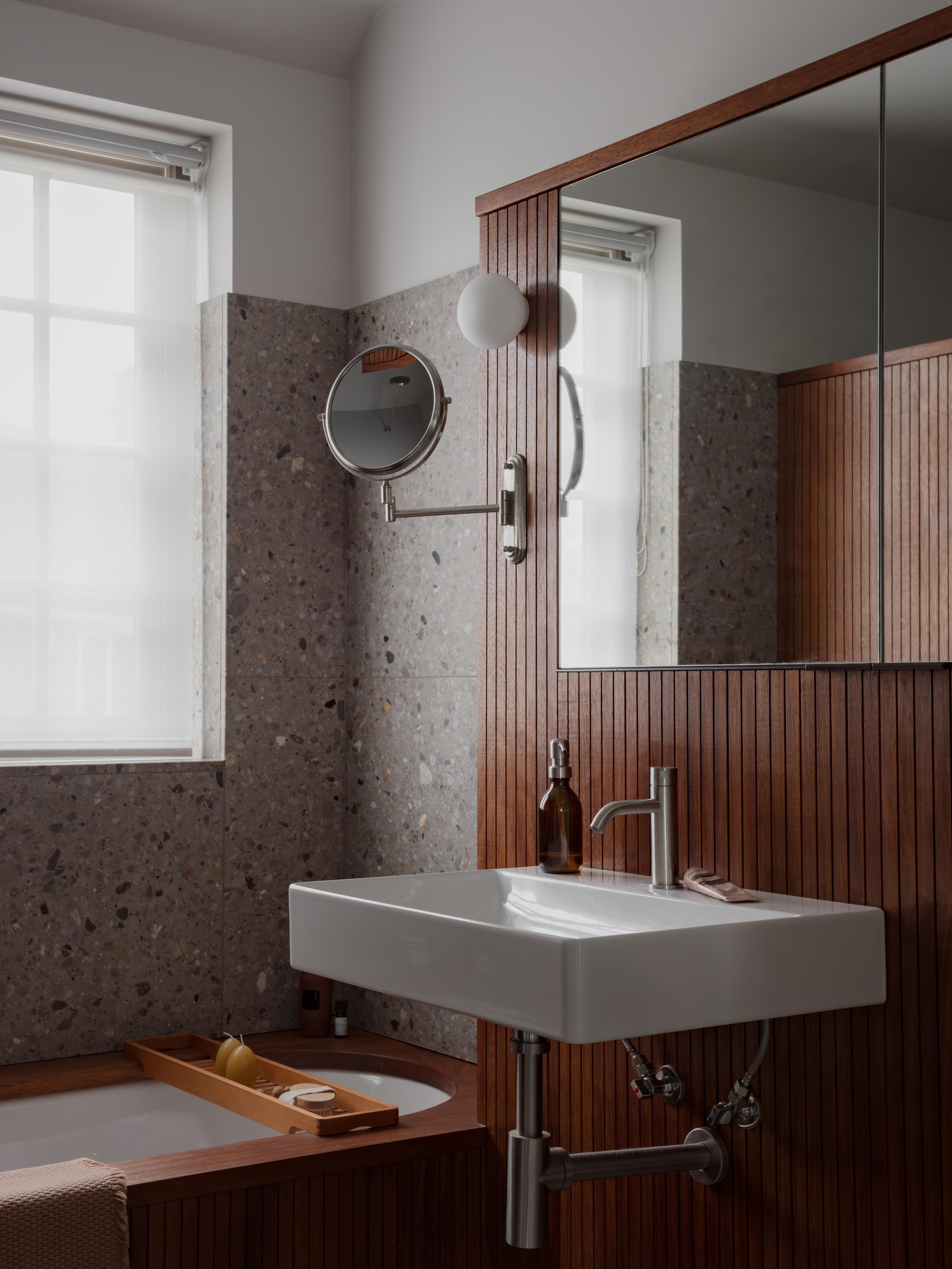 Iroko and terrazzo en suite bathroom