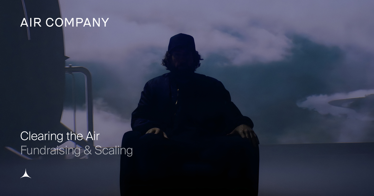 Silhouetted figure in a dark hat and cloak against a cloudy sky, with text 'AIR COMPANY', 'Clearing the Air', 'Fundraising & Scaling'.