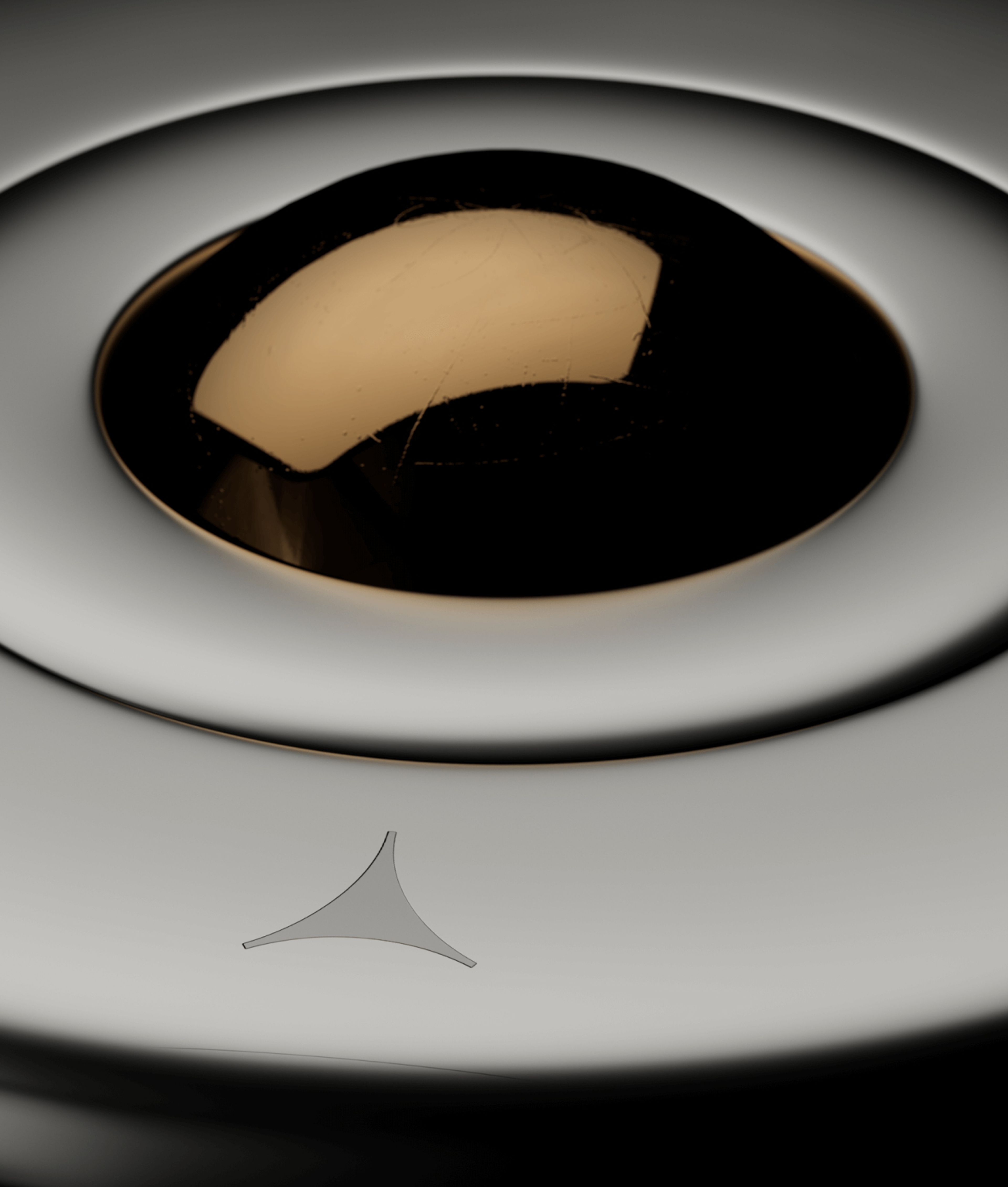 top of a conceptual fuel canister. matte silver design with a bronze ball in the middle