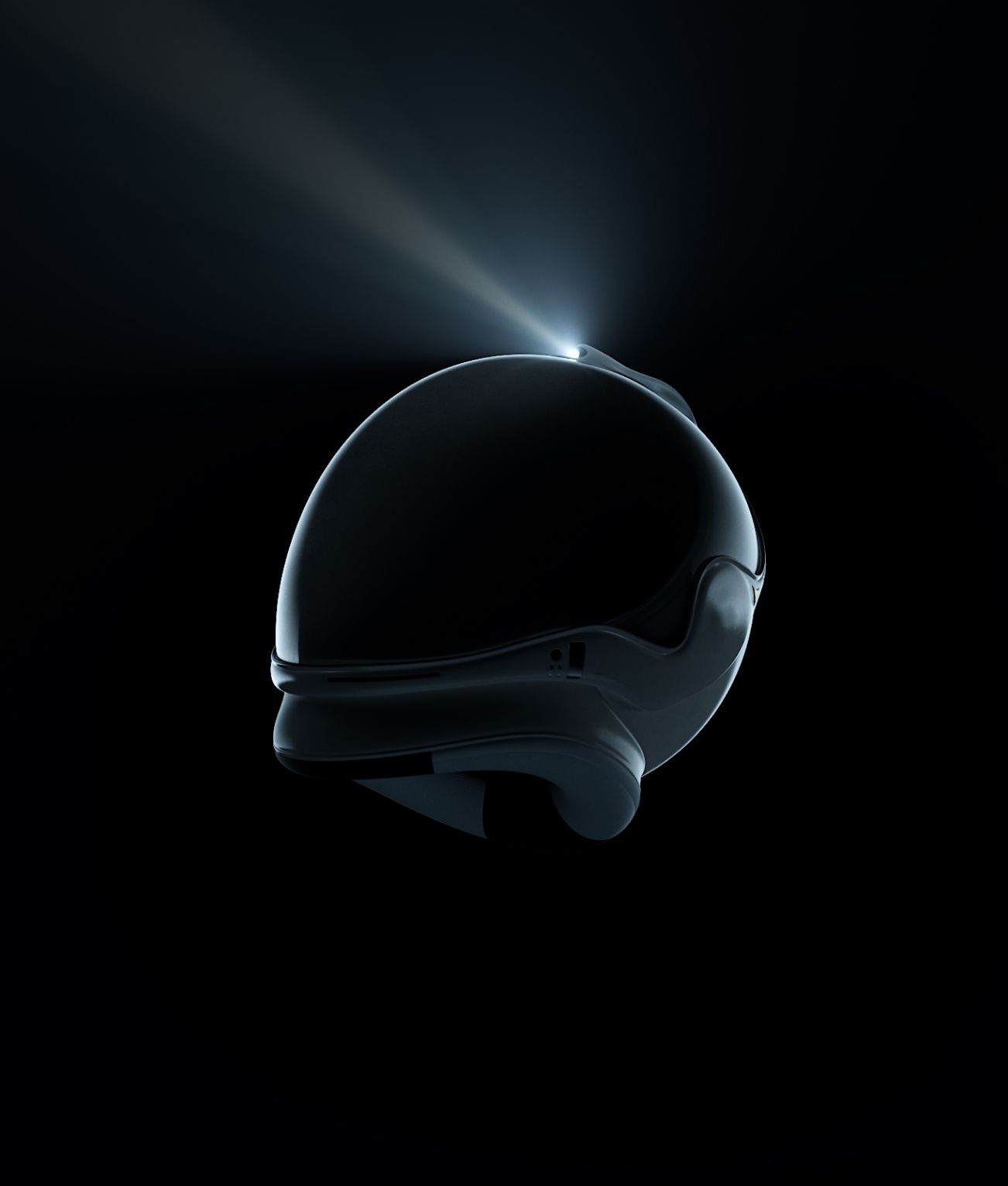 black silhouette of a space helmet with a white light beaming off the top