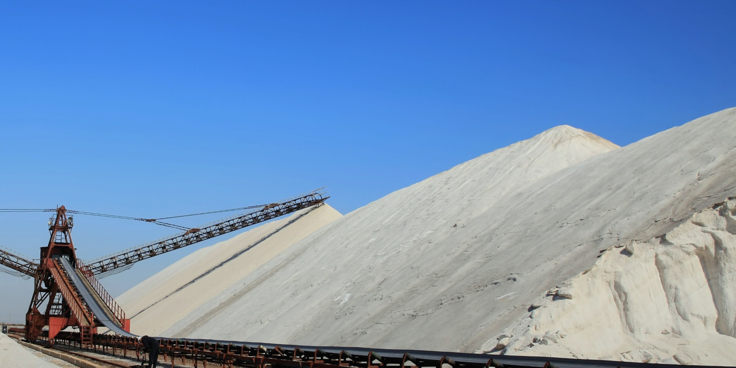 Clouds hovering over mountains
