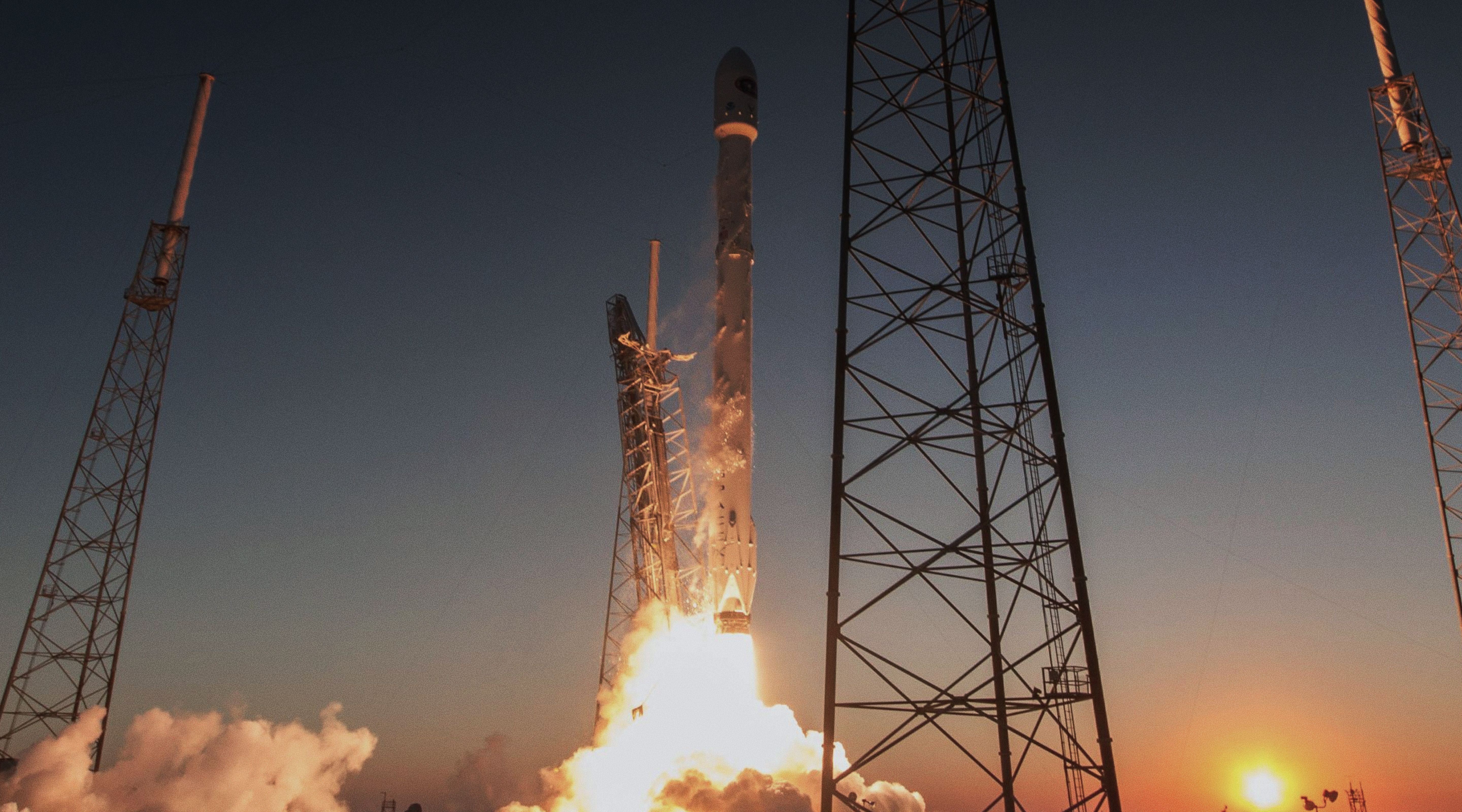 Space X Falcon 9 rocket ship taking off 