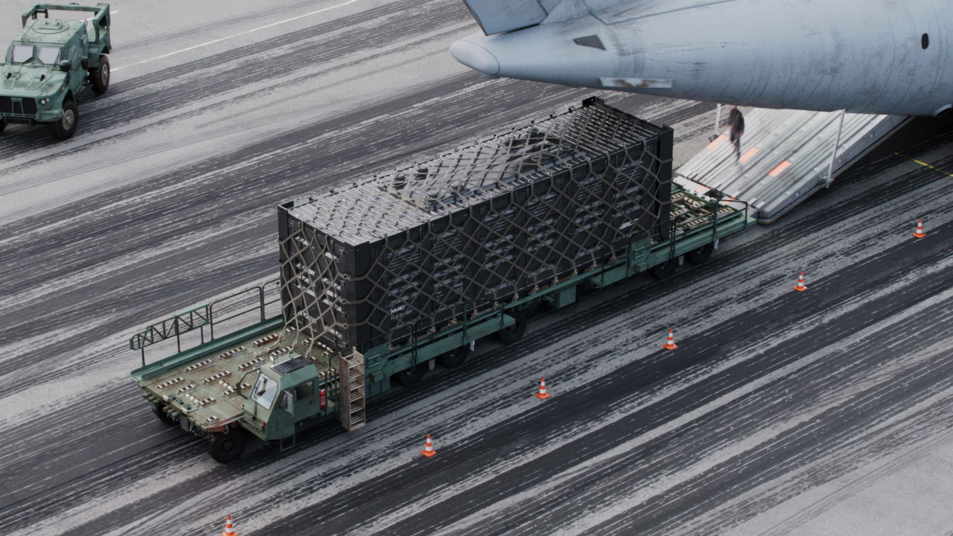 AIRCO MAD Fuel System being loaded into the rear of a military plane