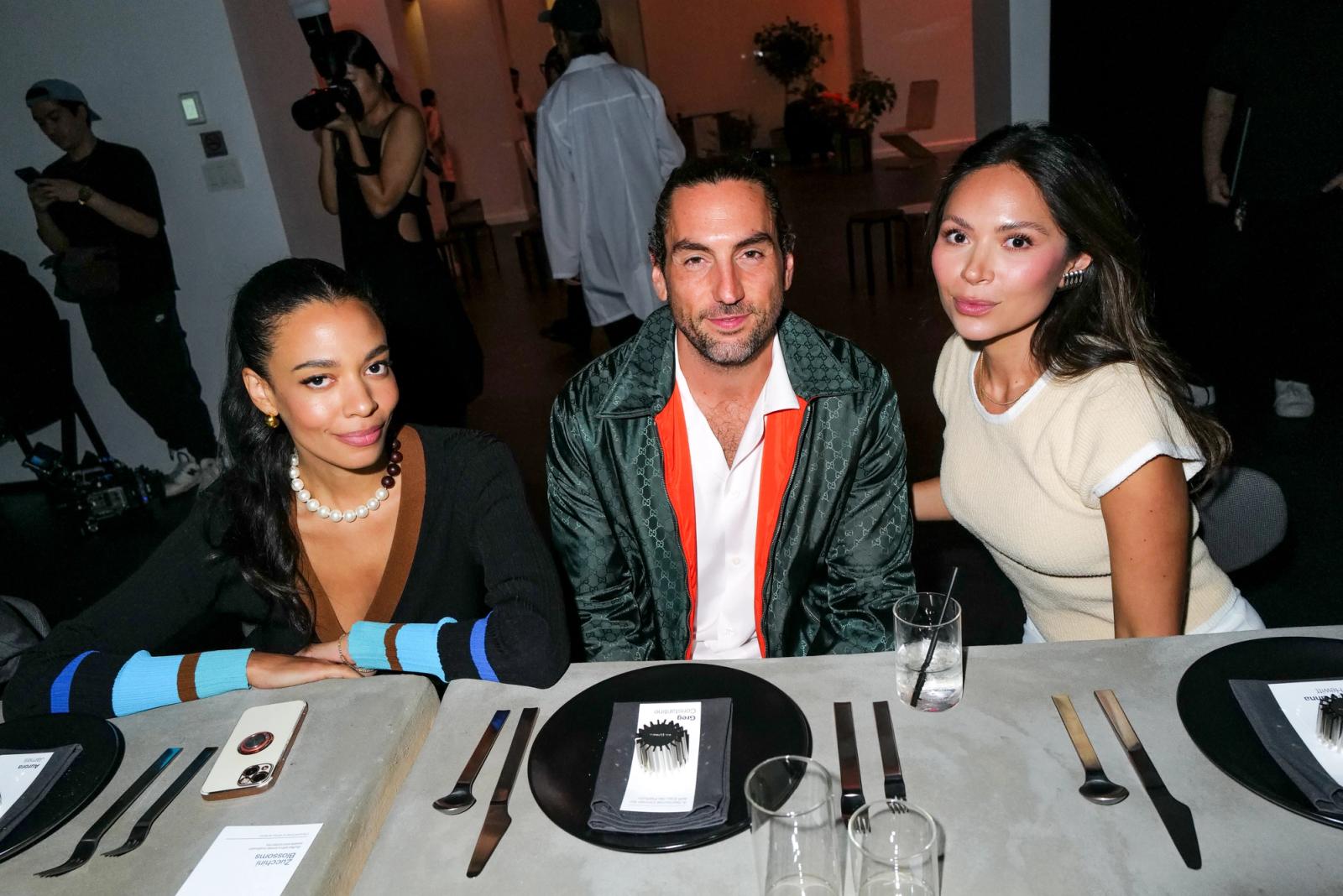 Gregory constantine, co-founder of AIRCO, at table with Aurora James and Marianna Hewitt