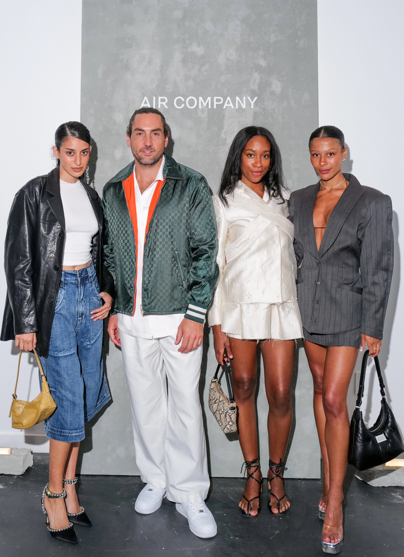 AIRCO co-founder Gregory Constantine with three guests