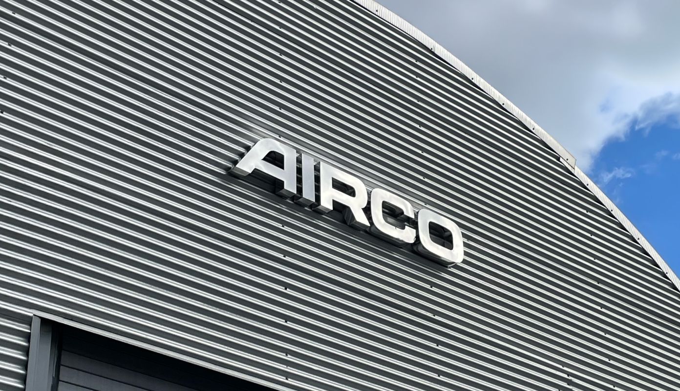 silver AIRCO lettering on a facility 