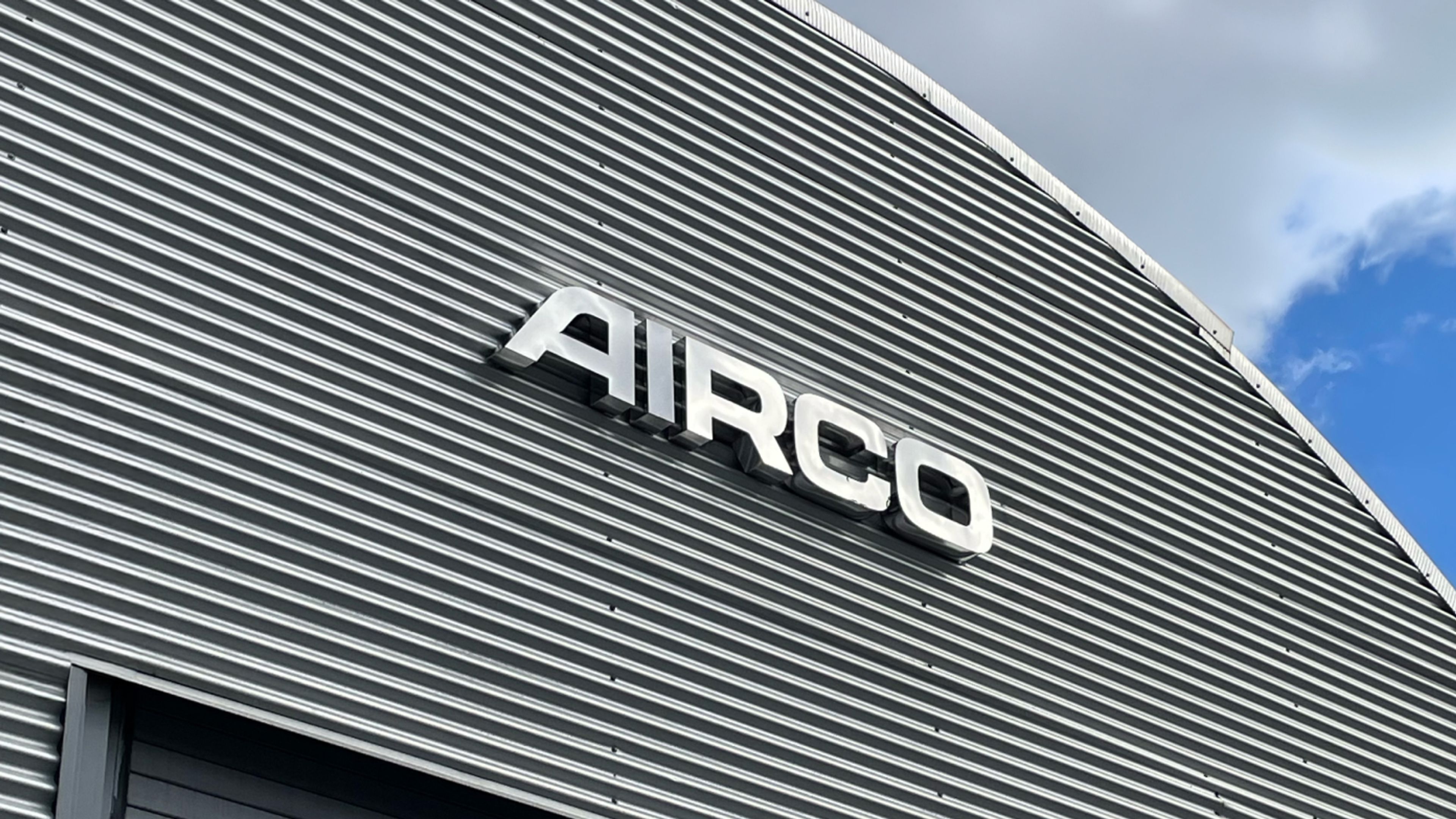 silver AIRCO lettering on a facility