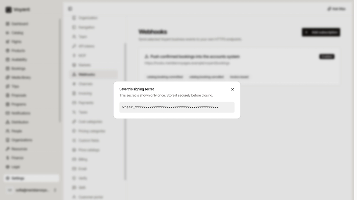A dialog reading save this signing secret, this secret is shown only once, store it securely before closing, with a masked secret value