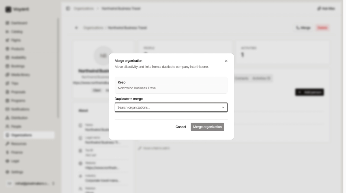 The merge organization dialog showing the record being kept and a search box for choosing the duplicate to merge into it