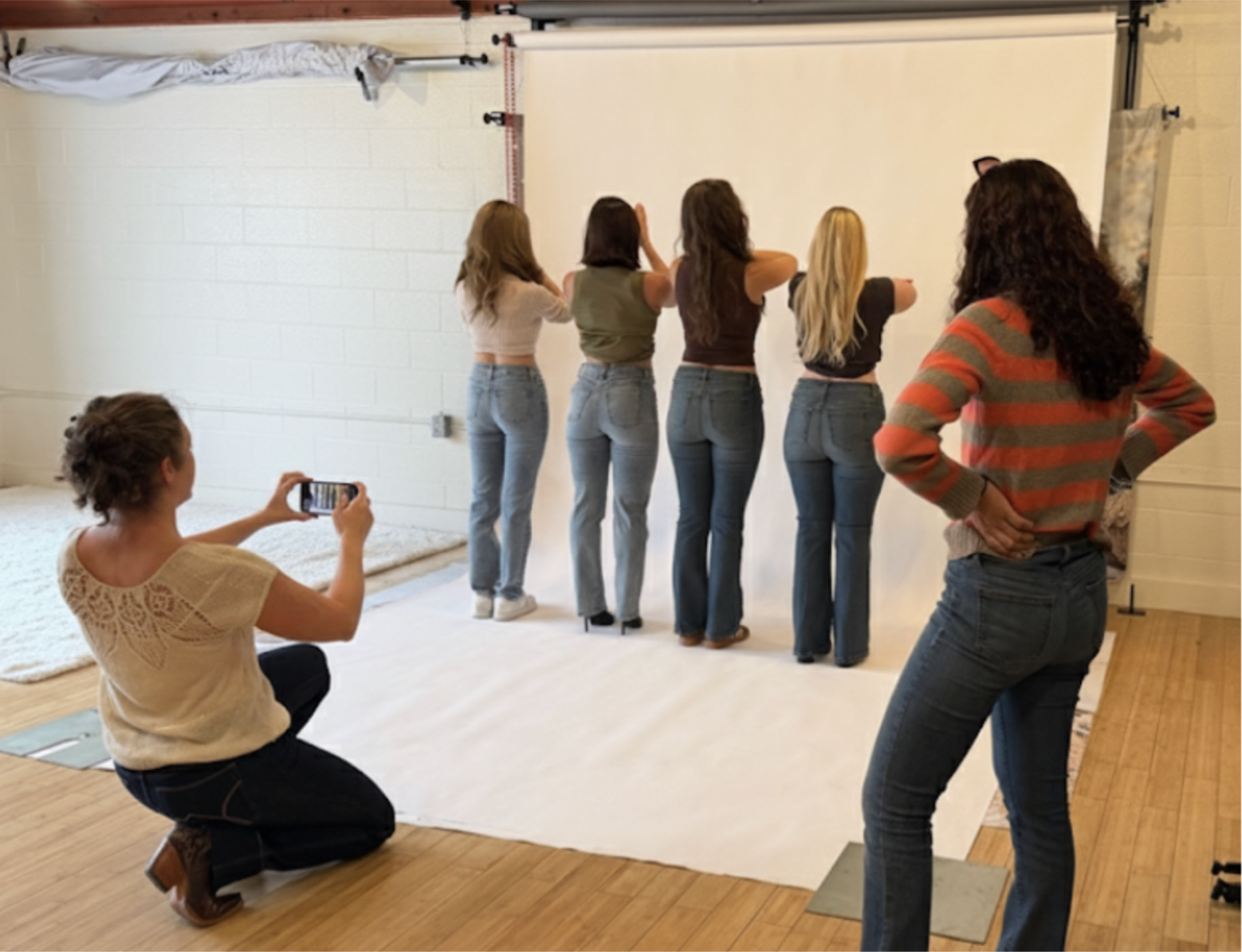 Karina Gupta reviewing a denim prototype