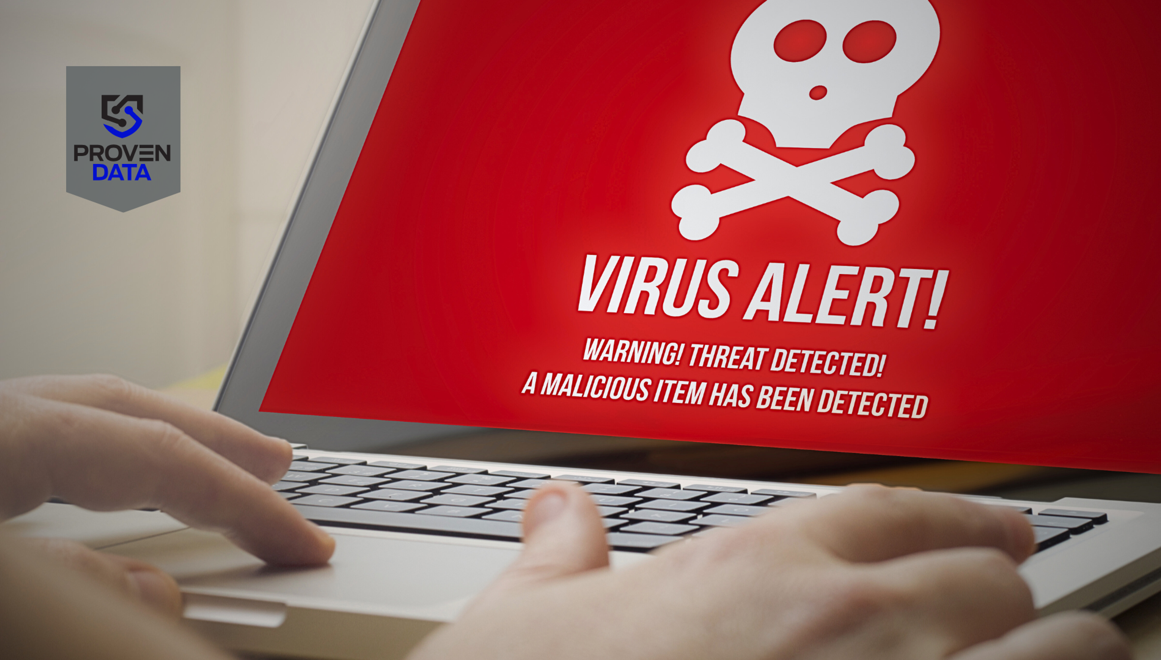 illustrative image of laptop screen with a red virus alert