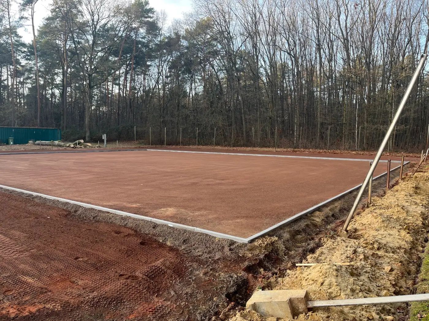 Level foundation with edging, ready for a padel court to be built