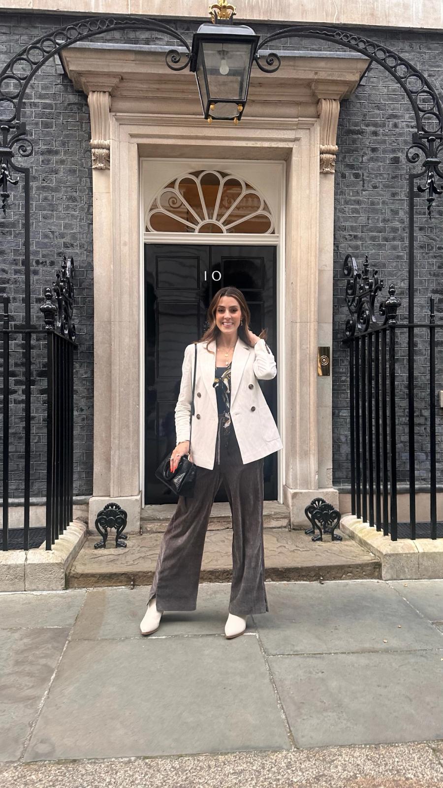 Em-J standing outside 10 Downing Street at the cruelty-free beauty event