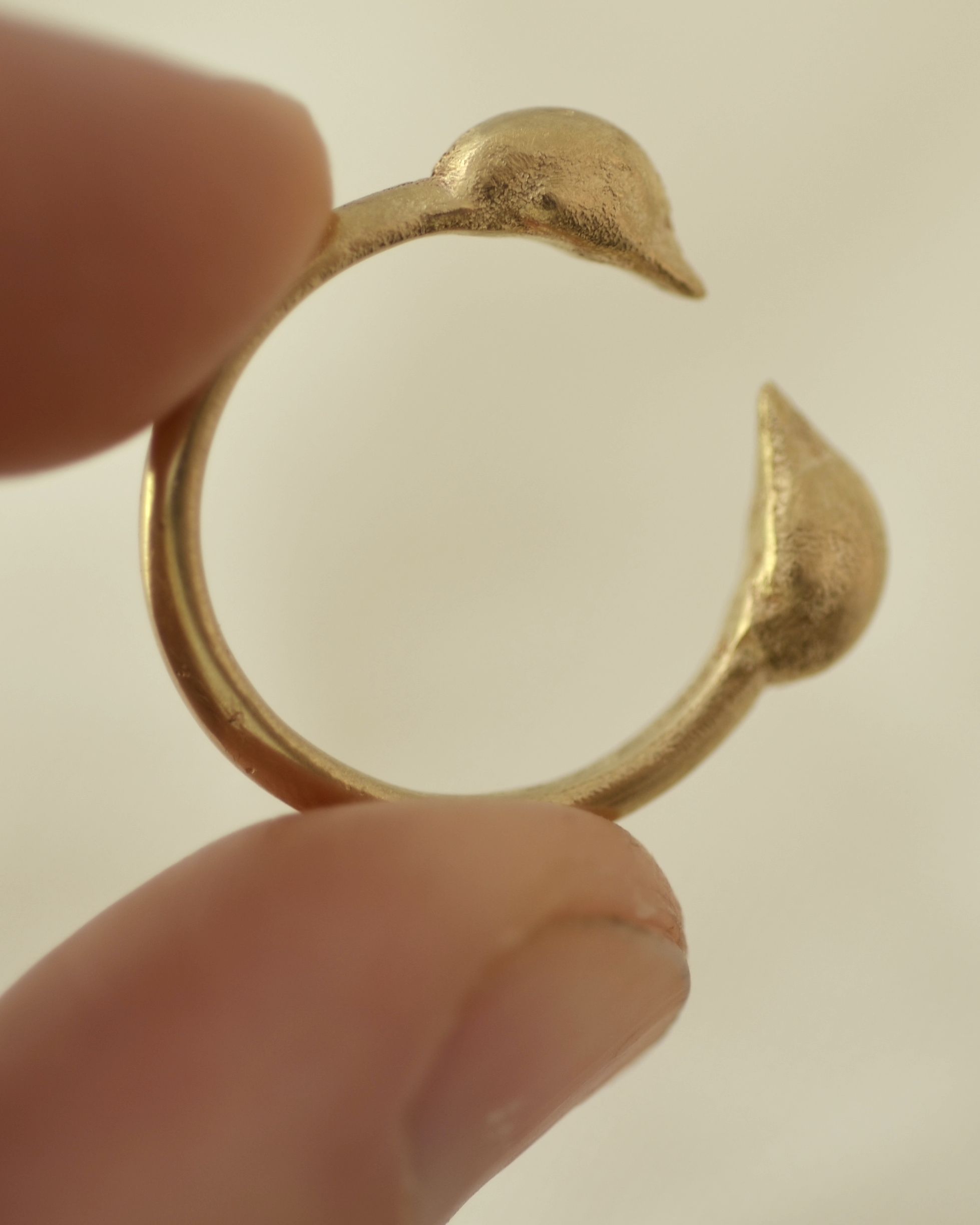 Sentinels ring between fingers