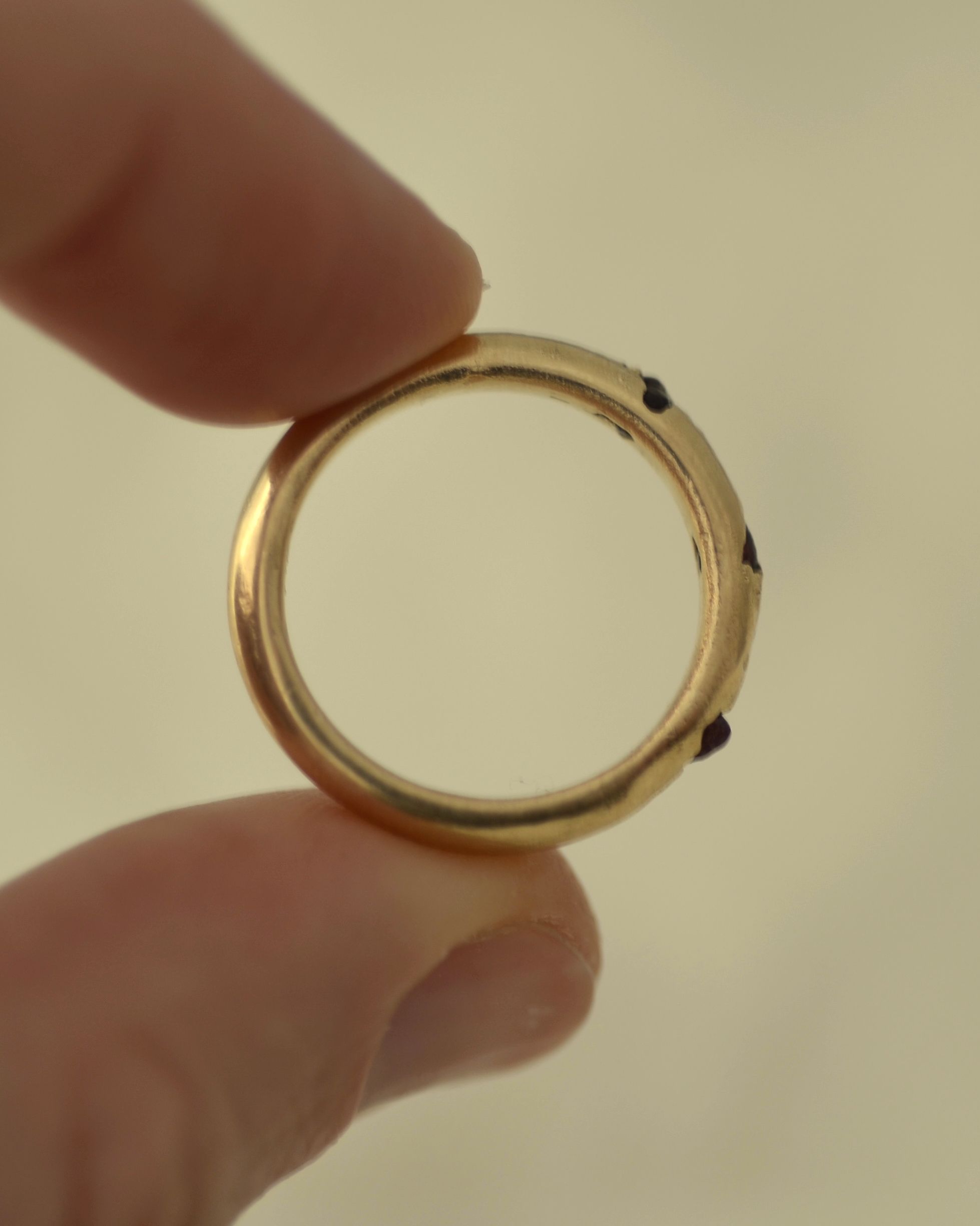 Rough garnet ring cast in place