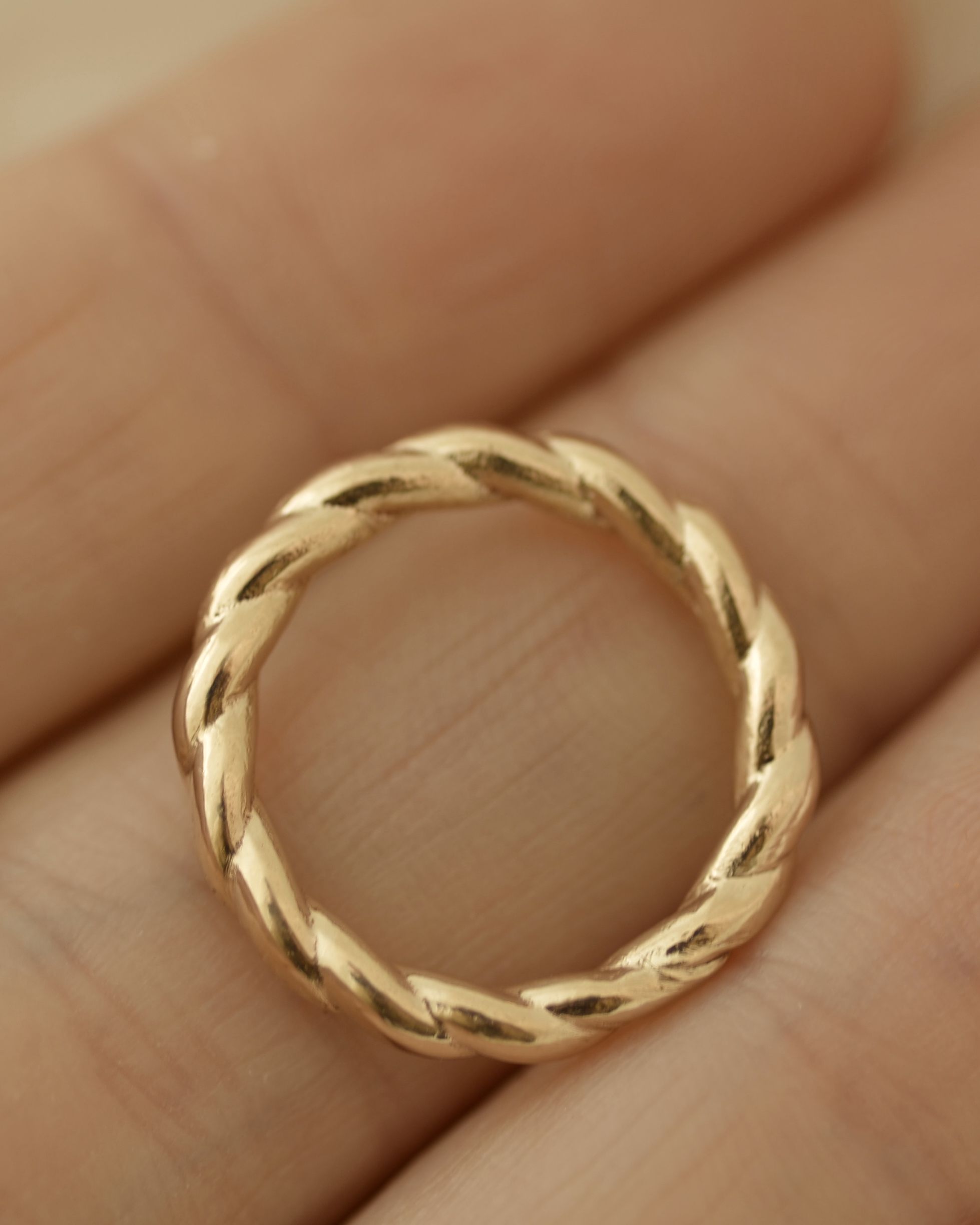 Rope ring on hand for scale