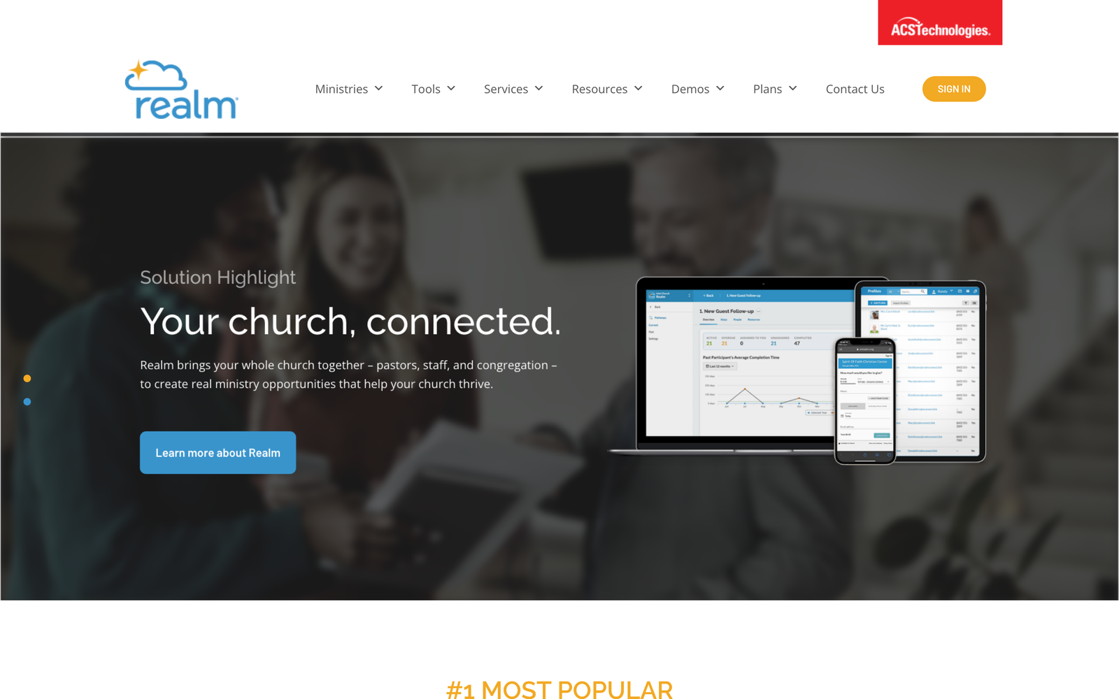 Realm by ACS Technologies homepage hero section