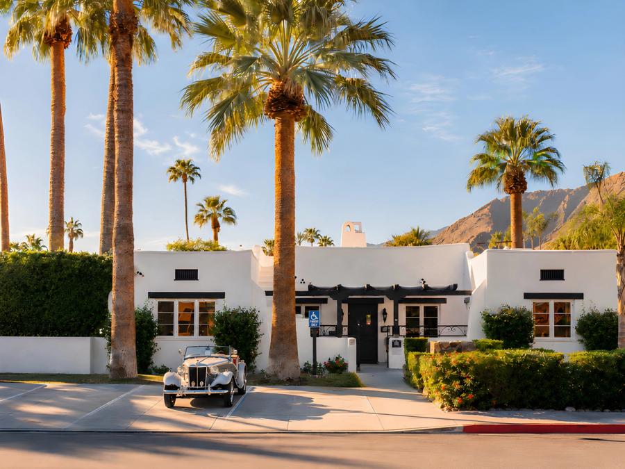 Vintage car outside the entrance of Gloria Palm Springs