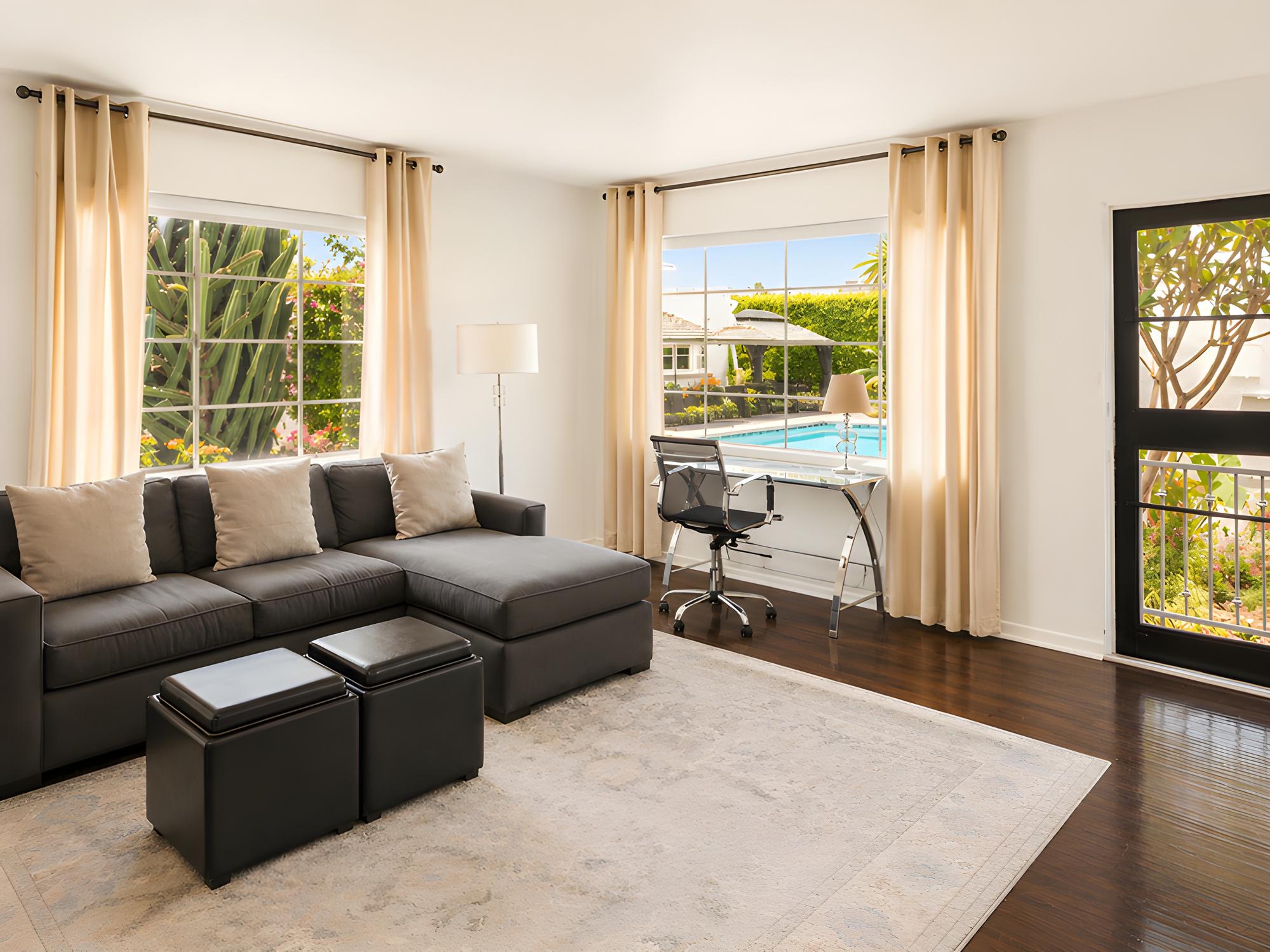 Garden-view living room in Sunset at Gloria Palm Springs