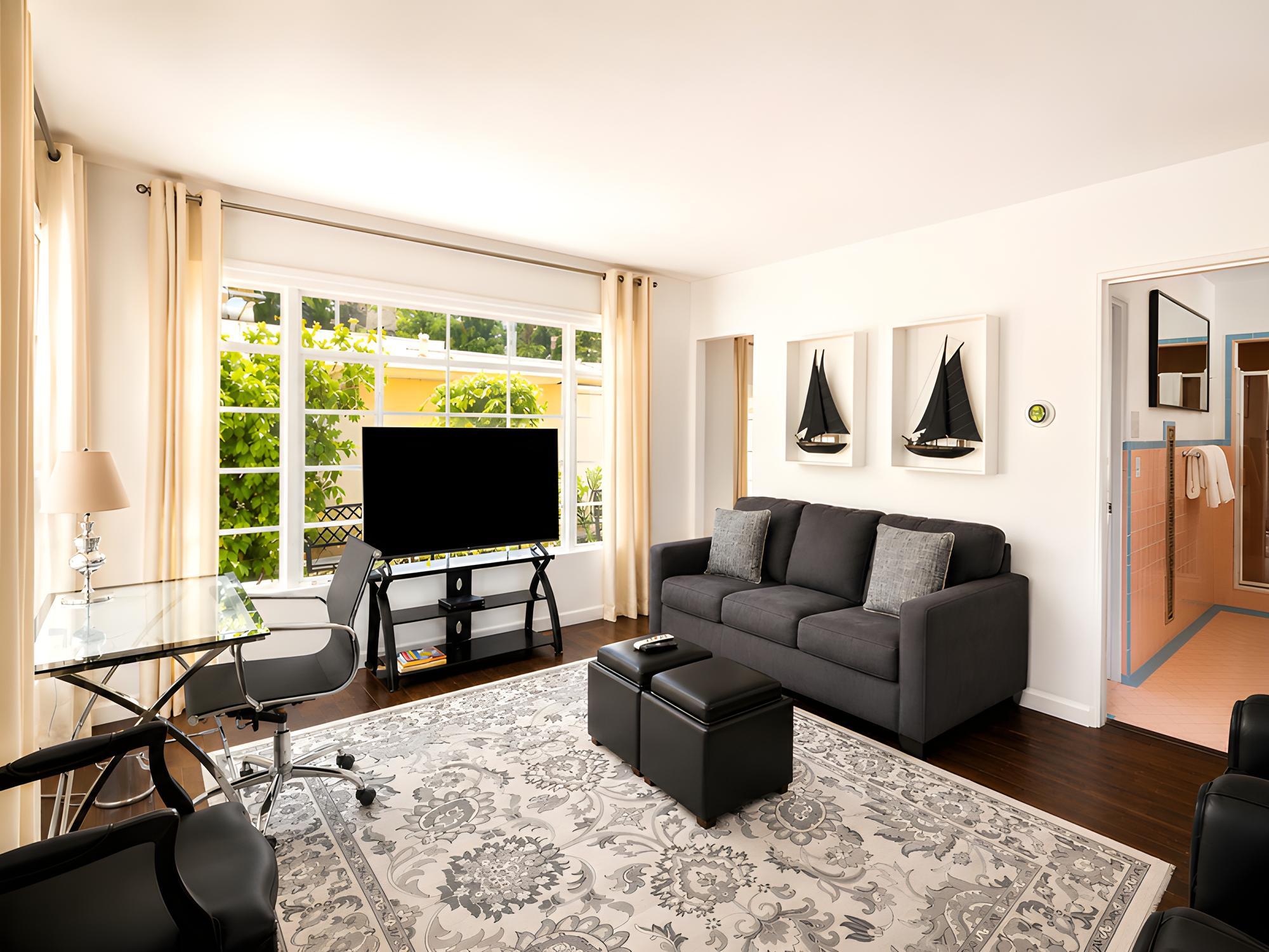Living room with mountain views in Paramount at Gloria Palm Springs
