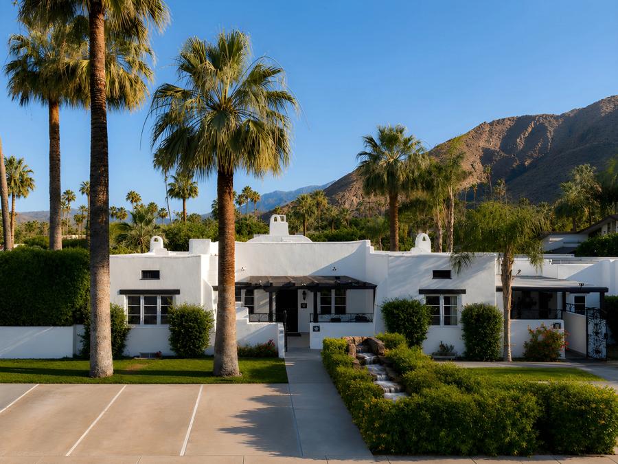Spanish-Revival front entrance of Gloria Palm Springs, a downtown Palm Springs boutique hotel