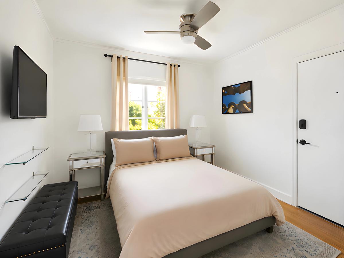 Queen bed in the Silent studio at Gloria Palm Springs