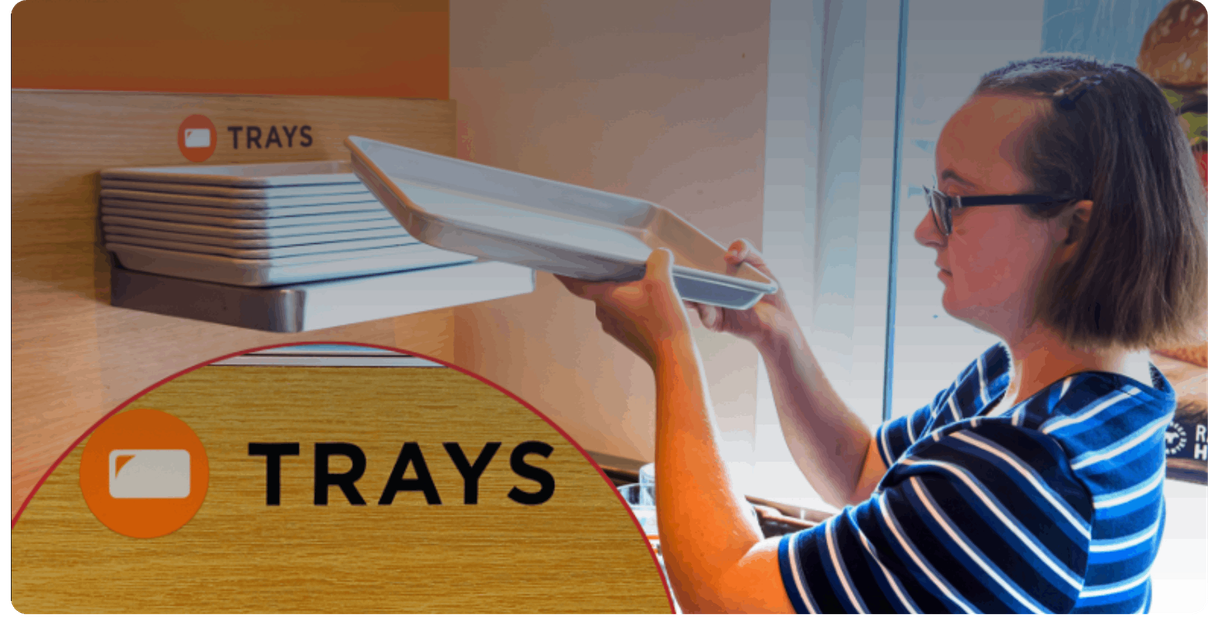 A diner puts a tray on the tray return at A&W