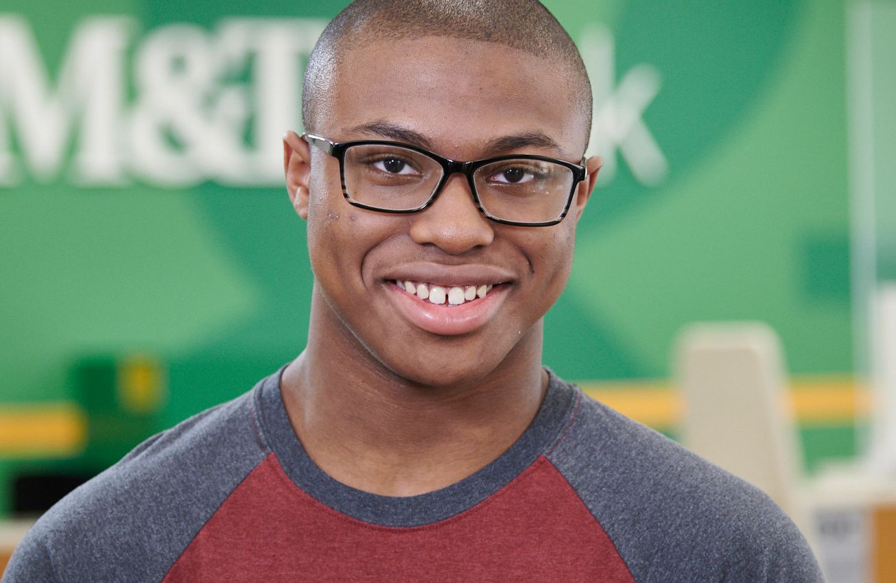 Young man smiling at M&T Bank