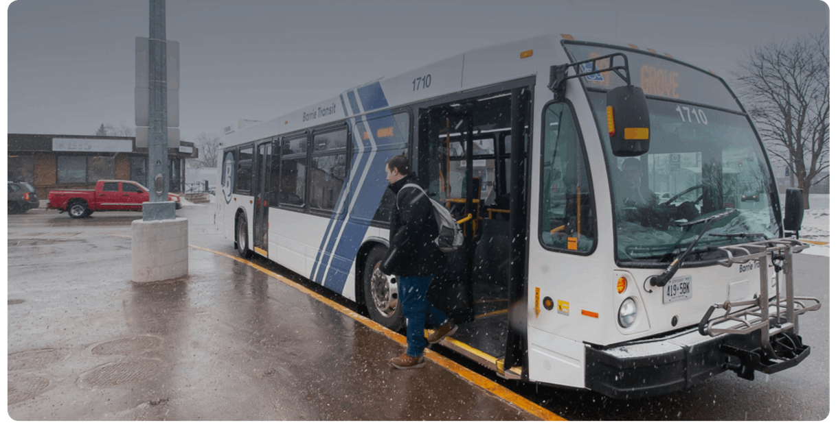A rider boards a Barrie Transit bus