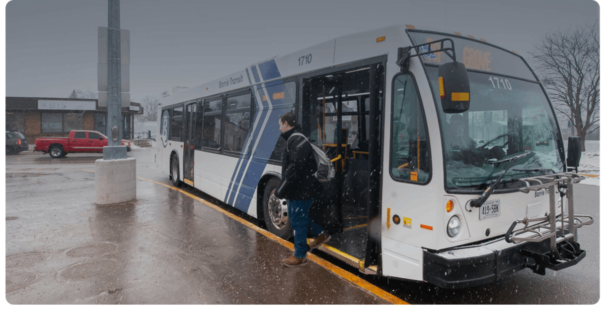 A rider boards a Barrie Transit bus