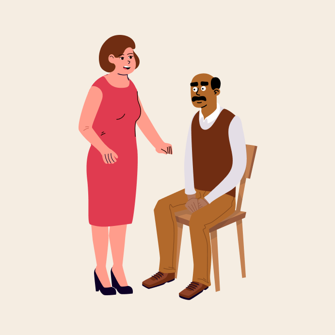 a woman standing next to a man sitting in a chair