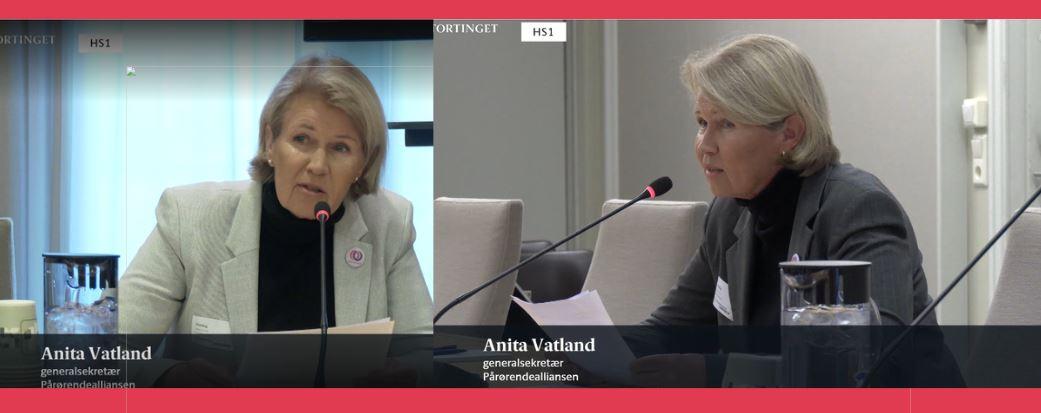 two women are sitting in front of microphones in a room .