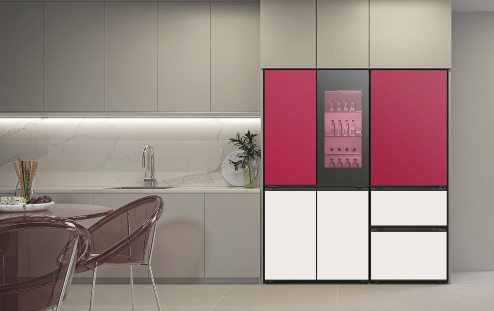 Sleek red LG refrigerator with a glass panel door and spacious compartments.