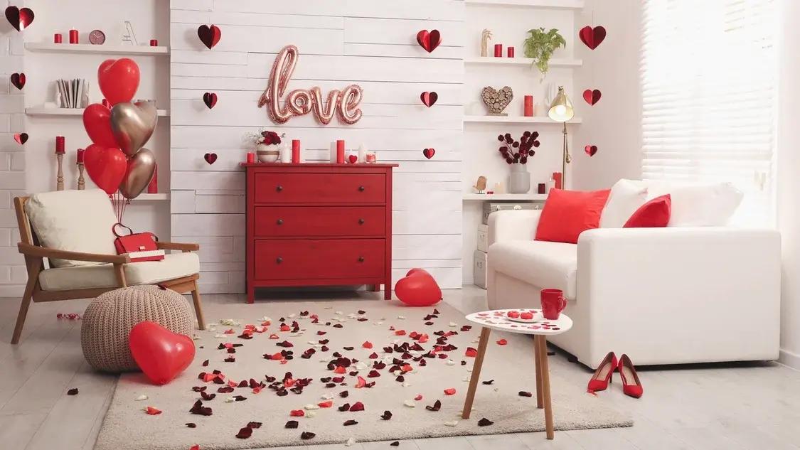 Bright living space with red dresser, balloons, and a ‘love’ sign for Valentine’s Day.