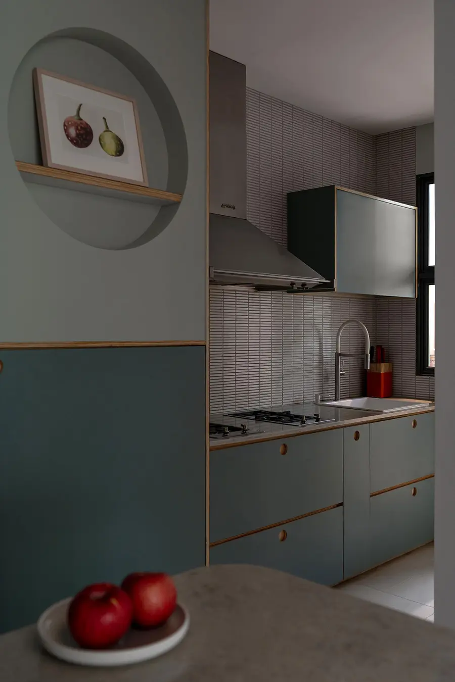 Monochromatic green carpentry within the kitchen