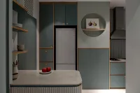 Kitchen with marble counter top and monochromatic green carpentry