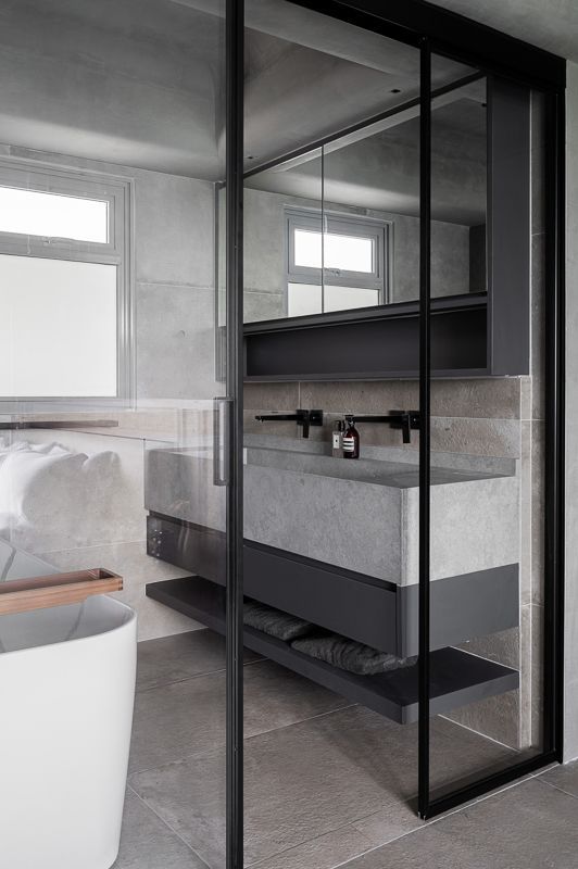 Contemporary bathroom with a sleek white bathtub