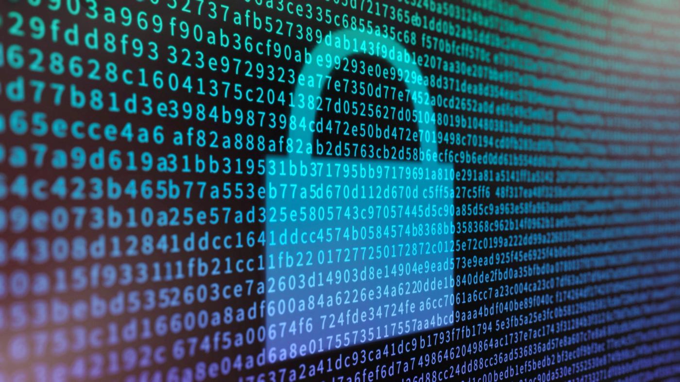 Data encryption concept with a screen full of hexadecimal information and padlock symbol