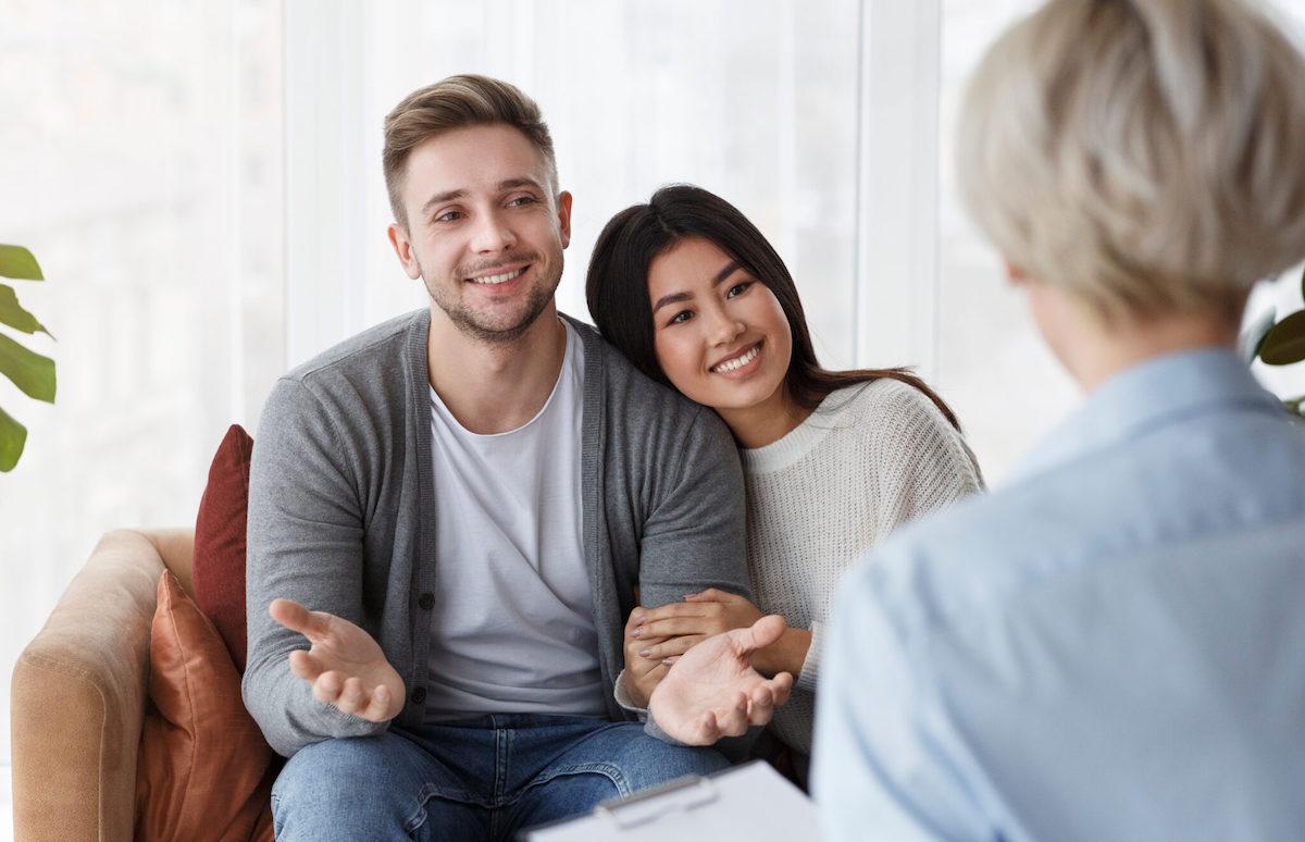 A couple meeting with a counselor at Pure Heart