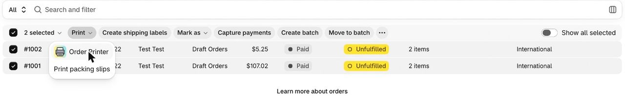 Deux commandes sélectionnées dans l’admin Shopify, menu Print ouvert sur Order Printer